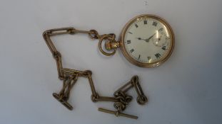 A GOLD PLATED DENNISON POCKET WATCH ON A BRASS CHAIN