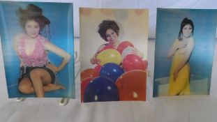 THREE POSTCARDS DEPICTING SEMI-NAKED WOMEN IN VARIOUS POSES - CLOTHES AND PROPS APPEARING ON THE