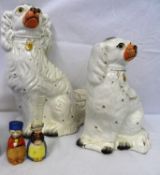 TWO VICTORIAN STAFFORDSHIRE PORCELAIN SPANIELS HAVING PAINTED FEATURES AND GILT COLLAR AND CHAIN,