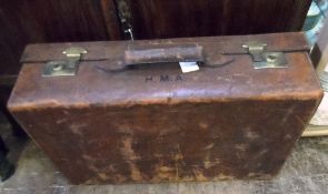 A VINTAGE LEATHER SUITCASE WITH THE EMBOSSED INITIALS H.M.A.  ( HARRY ANDREWS - HUSBAND OF DAME