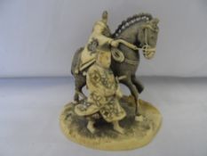 AN ANTIQUE CARVED CHINESE IVORY STUDY DEPICTING A GOWNED WARRIOR ON HORSEBACK WITH TWO OTHER