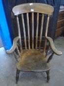 AN ANTIQUE ELM FARMHOUSE CHAIR