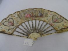 A CIRCA 1780 FRENCH LINEN AND IVORY MARRIAGE FAN. THE MOUNT HAVING TOO HEART SHAPED CARTOUCHES