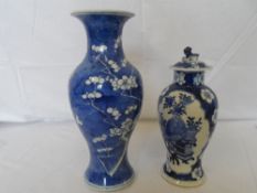 A CHINESE BLUE AND WHITE BALUSTER VASE WITH CHARACTER MARKS TO BASE DEPICTING CHERRY BLOSSOM, APPROX