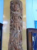 AN INTRICATELY CARVED MALAYSIAN WOODEN TRIBAL STATUE HAVING TWO FEMALE FIGURES WITH CLAWED FEET