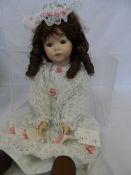 AN ALBERON PORCELAIN DOLL`BETHANY`  WITH PORCELAIN HEAD AND SHOULDERS AND PORCELAIN LOWER ARMS AND
