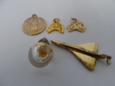 A 9CT GOLD HALLMARKED CONCORD PENDANT TOGETHER WITH A ST CHRISTOPHER AND TWO AUSTRALIAN CHARMS.