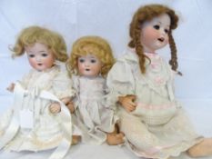 THREE HEUBACH KOPPELSDORF PORCELAIN HEADED DOLLS WITH COMPOSITE ARMS AND LEGS INSCRIBED TO HEADS 300