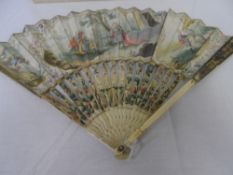 A NORTHERN EUROPEAN CIRCA 1750  HAND PAINTED IVORY BIBLE FAN. THE MOUNT HAVING THREE CARTOUCHE