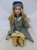 AN ARMAND MARSEILLE PORCELAIN HEADED DOLL INSCRIBED 390 A.8.M `MADE IN GERMANY`, JOINTED ARMS AND