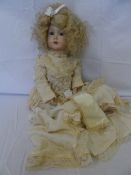 A COPY OF A SIMON & HALBIG DOLL NR 117, BY SUE TAYLOR, APPROX 23" WITH FINE IVORY LACE BODICE AND