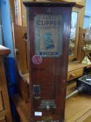 A VINTAGE WOODEN CASED PLAYERS CLIPPER CIGARETTE MACHINE BY CLEMENT GARRETT & CO. SHEFFIELD, APPROX.