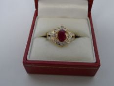 A 14 K HALLMARKED YELLOW GOLD LADY`S DIAMOND AND RUBY SET RING. THE RING HAVING DIAMONDS, 30 PTS,