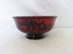 A ROYAL DOULTON FLAMBE WARE FRUIT BOWL DEPICTING A COUNTRY SCENE, APPROX. 20 CM DIAMETER