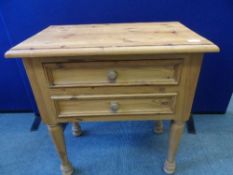 A RECLAIMED PINE BEDSIDE CABINET HAVING TWO DRAWERS ON TURNED LEGS, APPROX. 67 X 42 X 70 CM
