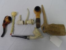 A MISC. COLLECTION OF MEERSCHAUM AND CLAY PIPES INCL. EDWARD VII, SCULL AND LARGE CLASSICAL  ( 7 )