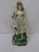 A HAND DECORATED FIGURE OF A LONDON LADY WITH HER DOG ADVERTISING PASCALLS CONFECTIONERY, APPROX. 33