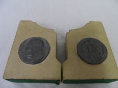 A PAIR OF STONE BOOKENDS - ONE HAVING A LEAD PLAQUE WITH BIG BEN AND THE WORDS  " THIS STONE CAME