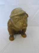 A PLASTER FIGURE OF A BULL DOG WEARING AN AIR RAID WARDEN`S HAT, THE HAT INSCRIBED WITH THE WORDS  "
