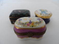 THREE PORCELAIN AND ENAMEL PILL BOXES INCL. A LIMOGES PEINT MAIN SIGNED J D TO BASE  ( 3 )