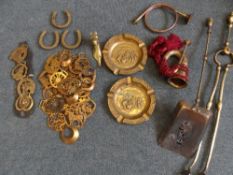A COLLECTION OF MISC. HORSE BRASSES TOGETHER WITH BRASS FIRE TONGS, COAL SCUTTLE,  TWO BRASS