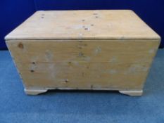 AN ANTIQUE PINE BLANKET CHEST ON SQUARE BLOCK FEET, APPROX. 57 X 78 X 50 CM