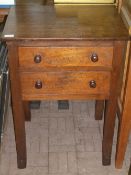 A MAHOGANY SIDE TABLE / BEDSIDE CABINET HAVING TWO DRAWERS ON SHAPED SLIGHTLY SPLAYED LEGS,