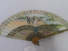 A CIRCA 19TH CENTURY EUROPEAN BAMBOO STICK FAN. THE HAND PAINTED MOUNT DEPICTING SPANISH DANCERS