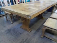 A LARGE RECLAIMED PINE DINNING / KITCHEN TABLE ON TWO SUPPORTS UNITED BY A STRETCHER, APPROX. 100