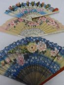 FIVE CIRCA 1900 JAPANESE HAND PAINTED PAPER FANS. ONE PAINTED BAMBOO DEPICTING BIRDS AND