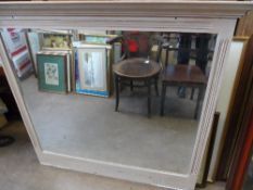 A LARGE STRIPPED PINE OVER MANTLE MIRROR WITH BEVELLED GLASS, APPROX. 134 X 123 CM