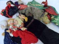 A COLLECTION OF SIX WOODEN HEADED PUPPETS INC. CROCODILE, PUNCH AND JUDY STYLE ETC.