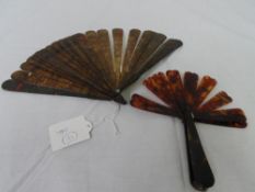 A VICTORIAN TORTOISESHELL POCKET FAN WITH TORTOISESHELL GUARD AND FAN STICKS. THE HEART SHAPED FAN