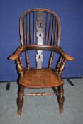 A SPINDLE BACK OAK WINDSOR ARMCHAIR