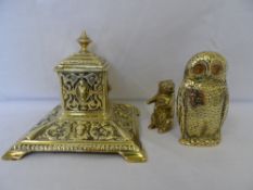 A VICTORIAN BRASS INKWELL DEPICTING LIONS TOGETHER WITH AN OWL MATCH HOLDER AND AN ANTIQUE VESTA