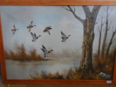 AN ORIGINAL OIL ON CANVAS DEPICTING DUCKS IN FLIGHT SIGNED K ROCHE APPROX. 91 X 61 CM