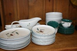 A PART DENBY GREEN WHEAT DINNER SERVICE COMPRISING EIGHT DINNER PLATES, EIGHT SIDE PLATES, SEVEN