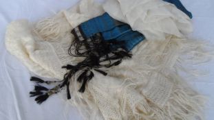 A VICTORIAN SILK CROCHET CHRISTENING SHAWL TOGETHER WITH A BLUE AND SILVER VINTAGE SHAWL HAVING LONG