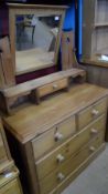 A RECLAIMED PINE DRESSING TABLE HAVING A MIRROR AND DRAWER TO THE TOP WITH TWO SHORT AND TWO LONG