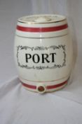 A CERAMIC BARREL WITH A TURNED TAP  " RICH CREAM SHERRY PRODUCE OF SPAIN "  APPROX. 28 CM HIGH