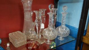 A COLLECTION OF MISC. VINTAGE GLASS INCL. DECANTERS, WATER JUGS, CANDLESTICKS ETC.