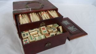 A CHINESE MAH-JONG SET WITH RULES, DATED 1922 HONG KONG