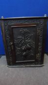 A VICTORIAN SMOKER`S OAK CORNER CABINET HAVING A CARVED FRIEZE TO EDGE OF FRONT, THE DOOR BEING