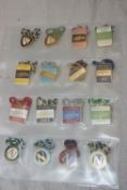 A COLLECTION OF SIXTEEN NEWMARKET RACECOURSE BADGES ( IN A PLASTIC WALLET )