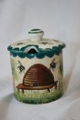 A WEMYSS HAND PAINTED PRESERVE POT DEPICTING HONEY BEES WITH IMPRESSED MARK TO BASE SIGNED T GOODE