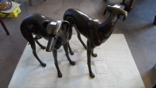 A PAIR OF LIFE SIZE BRONZE GREYHOUNDS, APPROX. 70 CM HIGH X 95 CM ( 2 )