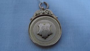 A 9ct HALLMARKED GOLD MEDALLION ENGRAVED PEMWORTHAM AND DISTRICT A & H SOCIETY SUTTON MEDAL 1922,