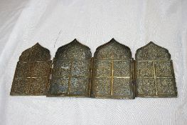 A CIRCA 19th CENTURY RUSSIAN BRASS TRAVELLING FOUR PANELLED TIPTRICH, THE BRASS PANELLLED ICON