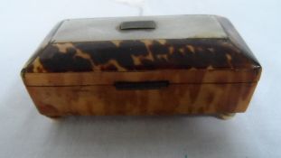 AN ANTIQUE TORTOISESHELL BOX HAVING MOTHER OF PEARL INLAY AND BEING ON IVORY BALL FEET, APPROX. 7