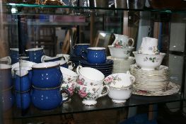 A PART WEDGWOOD CHARNWOOD TEA SET COMPRISING SANDWICH PLATE, MILK JUG, SUGAR BOWL, TWELVE PLATES,